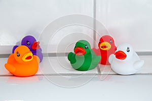 Colorful rubber ducks in the bathroom