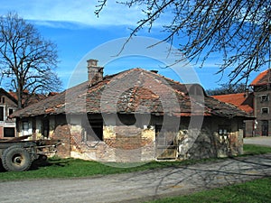 The colorful ruin of an old horse smithy.