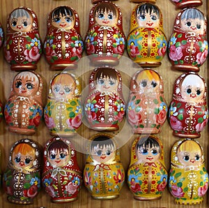 Colorful russian wooden dolls as fridge magnet