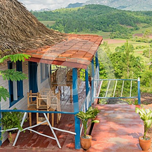 Colorful rustic wooden house at the Vinales Valley