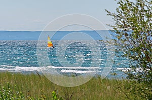 Colorful Sailboat Sailing on a Windy Sunny Summer Day on Georgian Bay