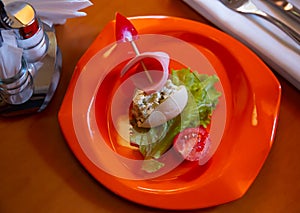 Colorful salad is decorated in form of ship. idea for children menu