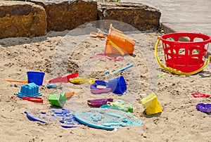 Colorful sand toys in the sand