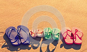 Colorful sandals at the beach