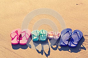 Colorful sandals at the beach