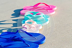 Colorful sandals at the beach