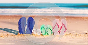 Colorful sandals at the beach