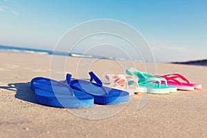 Colorful sandals at the beach