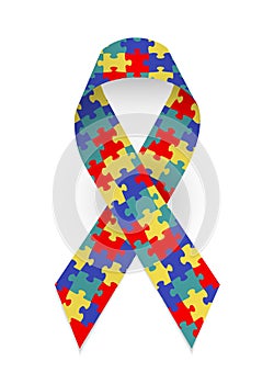 Colorful satin puzzle ribbon as symbol autism awareness