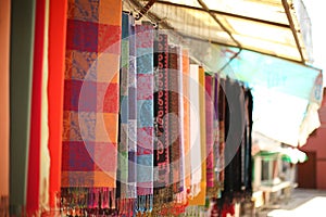 Colorful scarfs in row