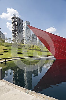 Colorful scene of artificial lake and red auditorium photo
