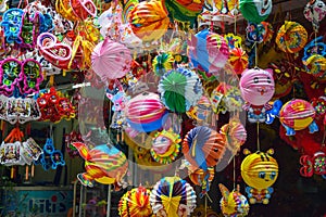 Colorful scene, friendly vendor on Hang Ma lantern street, lantern at open air market, traditional culture on mid autumn