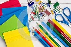 Colorful school requisites on a desk