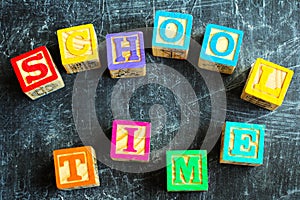 Colorful School Time word from wooden blocks