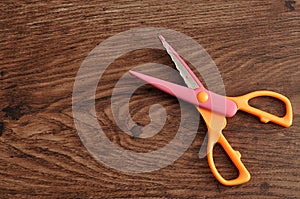 A colorful scissor that cut a zigzag pattern