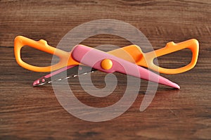 A colorful scissor that cut a zigzag pattern