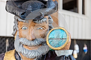 Colorful sculpture of a sailor holding a telescope, Murrells Inlet, SC, United States
