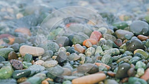 Colorful Sea Stones In Water. Stones Under Water. Nautical Background. Pebbles On The Beach. Still.
