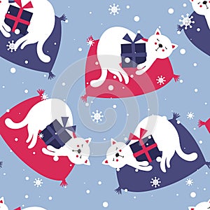 Colorful seamless pattern with cats, gifts, snow. Decorative cute background with animals, presents. Merry christmas