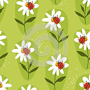 Colorful seamless pattern with ladybugs and flowers. Decorative cute background, funny insects and garden