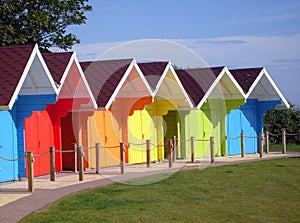 Colorful seaside beach chalets photo