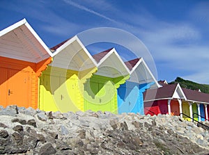 Colorful seaside beach chalets