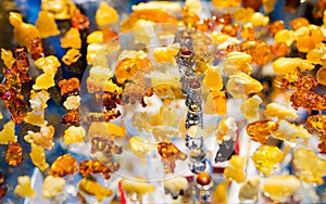 Colorful set of amber - a collection of animal figurines - a typical souvenir from Gdansk, amber workshops in Mariacka Street in