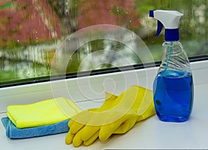 A colorful set for cleaning various surfaces in the kitchen, bathroom and other rooms. The concept of cleaning. Early spring regul