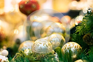 Colorful, shiny christmas decoration. Glass balls and pine tree branches. Holiday background concept