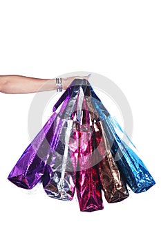 Colorful shopping bags with hand