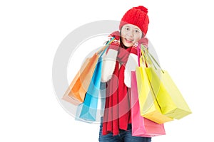 Colorful shopping bags holding by happy pretty asian woman