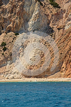 Colorful shoreline on Milos island, Greece