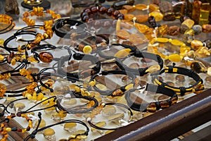 Colorful showcases of traditional jewelry stores and amber gemstone products in city market square in Gdansk Poland