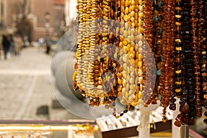 Colorful showcases of traditional jewelry stores and amber gemstone products in city market square in Gdansk Poland