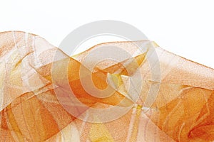 Colorful silk orange scarfs background