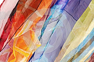 Colorful silk scarfs background