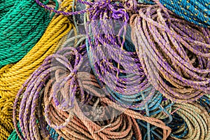Colorful sink, hydropro and float ropes used for lobster traps piled up