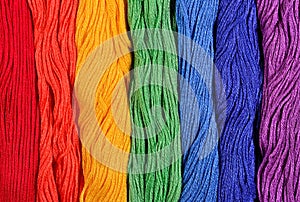 Colorful skeins of floss as background texture