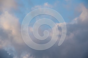 Colorful sky background - dramatic stormy clouds in the evening sky. Vast cloudy sky landscape. Colorful sky landscape scene