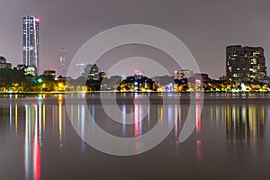 Colorful skyline reflection of downtown Hanoi skyscrapers from West Lake