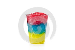 Colorful slushie of differents flavors with straw in plastic cup photo