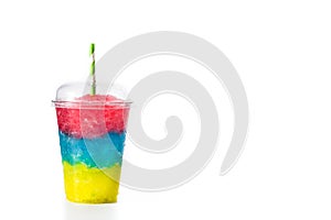 Colorful slushie with straw in plastic cup