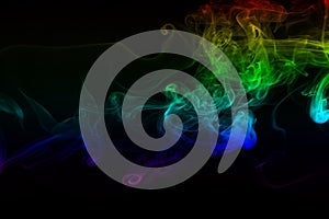 Colorful smoke abstract on black background, Movement of fire design