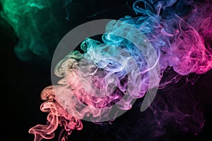 Colorful smoke on dark background photo