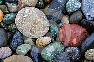 Colorful smooth rocks on the beach