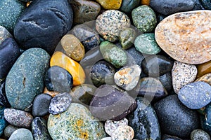 Colorful smooth rocks on the beach