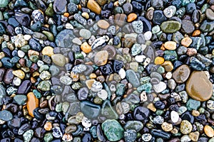 Colorful smooth rocks on the beach