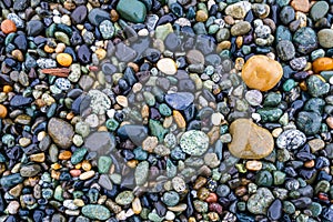 Colorful smooth rocks on the beach