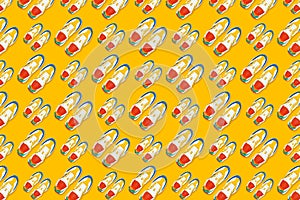 Colorful sneakers on yellow background, Seamless pattern