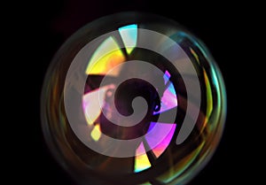 Colorful soap bubble isolated on black